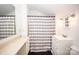Bathroom featuring a shower, vanity, and mirror at 899 Wendover Rd # 29, Statesville, NC 28677