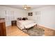Comfortable bedroom with hardwood floors, natural light, and simple decor at 899 Wendover Rd # 29, Statesville, NC 28677