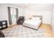 Bedroom features a comfortable bed, chair, and natural light at 899 Wendover Rd # 29, Statesville, NC 28677