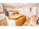 Bright dining room adjacent to kitchen with modern lighting and neutral decor at 899 Wendover Rd # 29, Statesville, NC 28677