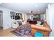 Bright living room featuring hardwood floors, unique decor, and a cozy fireplace at 899 Wendover Rd # 29, Statesville, NC 28677