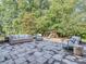 Outdoor patio featuring comfortable seating and a playground at 9422 Olivia Ln, Charlotte, NC 28277