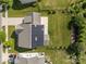 Aerial view of property with solar panels, landscaping, a patio and fencing at 9937 Violet Cannon Nw Dr, Concord, NC 28027