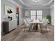 Elegant dining room with a large table, modern decor, and ample natural light at 9937 Violet Cannon Nw Dr, Concord, NC 28027