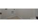 Clean laundry room with tile floors and white walls at 9937 Violet Cannon Nw Dr, Concord, NC 28027