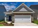 Charming single-Gathering home showcasing a brick facade and a convenient two-car garage, offering a blend of style and functionality at 1255 Langston Ln, Salisbury, NC 28144