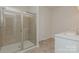 Modern bathroom with glass shower and double vanity, offering style and functionality at 1272 Langston Ln, Salisbury, NC 28144