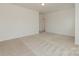 Spacious carpeted bedroom with neutral paint, natural light, and ample closet space at 1272 Langston Ln, Salisbury, NC 28144