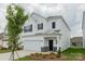 Inviting two-story home with a manicured lawn, and mature shade tree at 1272 Langston Ln, Salisbury, NC 28144