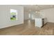 Open concept kitchen and dining area filled with natural light at 1272 Langston Ln, Salisbury, NC 28144
