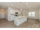 Open-concept kitchen with a center island and ample counter space at 1272 Langston Ln, Salisbury, NC 28144