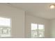 Bright living room with two large windows allowing for plenty of natural light at 1272 Langston Ln, Salisbury, NC 28144