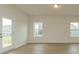 Bright living room with hardwood floors and two windows allowing for plenty of natural light at 1272 Langston Ln, Salisbury, NC 28144