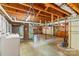 Spacious unfinished basement with exposed ductwork and beams at 1321 Arbor Dr, Salisbury, NC 28144