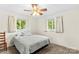 Bright bedroom with two windows and neutral carpeting at 1321 Arbor Dr, Salisbury, NC 28144