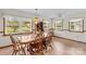 Traditional dining room featuring a wooden table, chairs, and ample natural light at 1321 Arbor Dr, Salisbury, NC 28144