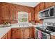 Kitchen featuring wood cabinets, light countertops and stainless steel appliances at 1321 Arbor Dr, Salisbury, NC 28144