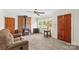 Comfortable living room with a brick fireplace and plenty of natural light at 1321 Arbor Dr, Salisbury, NC 28144