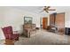 Cozy living room features a brick fireplace and plush seating, perfect for relaxing at 1321 Arbor Dr, Salisbury, NC 28144