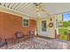 Inviting covered porch with ceiling fan and decorative rug provides a relaxing outdoor space at 1321 Arbor Dr, Salisbury, NC 28144