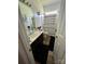 Cozy bathroom featuring modern vanity, shower with curtain, and decorative accents at 13409 Planters Row Dr, Charlotte, NC 28278