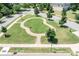 Aerial view showcasing the neighborhood common area with benches and decorative landscaping at 16324 Loch Raven Rd, Huntersville, NC 28078