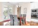 Cozy dining area with hardwood floors, stylish chairs, and easy access to the kitchen at 16324 Loch Raven Rd, Huntersville, NC 28078