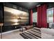 Home theater with projector screen, dark walls, and comfortable seating for entertainment at 16324 Loch Raven Rd, Huntersville, NC 28078