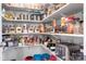Organized pantry featuring shelves stocked with various food items, containers, and kitchen appliances at 16324 Loch Raven Rd, Huntersville, NC 28078