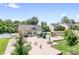 Community playground with slide, climbing structures, and seesaw, adjacent to a pool at 16324 Loch Raven Rd, Huntersville, NC 28078