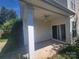 View of the back porch with sliding glass doors leading inside and a ceiling fan for comfort at 1715 Crabapple Tree Ln, Charlotte, NC 28214