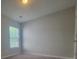 Spacious bedroom with carpet floors and a window at 1715 Crabapple Tree Ln, Charlotte, NC 28214