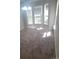 Bright dining room with neutral paint, carpet, and large windows offering ample natural light at 1715 Crabapple Tree Ln, Charlotte, NC 28214