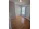 Bright office with hardwood floors, window, and built-in shelves at 1715 Crabapple Tree Ln, Charlotte, NC 28214