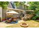 Spacious backyard with patio furniture and outdoor fire pit at 1887 Steeplechase Dr, Rock Hill, SC 29732