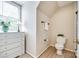 Well-lit bathroom featuring white dresser and toilet at 1887 Steeplechase Dr, Rock Hill, SC 29732