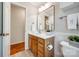 Bathroom featuring wood vanity with white countertop, modern fixtures, and stylish decor at 1887 Steeplechase Dr, Rock Hill, SC 29732