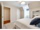 Bedroom with cozy carpet, natural light, a built-in shelf and an adjacent closet at 1887 Steeplechase Dr, Rock Hill, SC 29732
