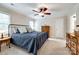 Bedroom with ceiling fan, carpeted floor, and queen bed with metal frame at 1887 Steeplechase Dr, Rock Hill, SC 29732