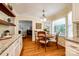 Sunlit breakfast nook featuring hardwood floors and a round table, perfect for casual dining at 1887 Steeplechase Dr, Rock Hill, SC 29732