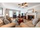 Bright living room with hardwood floors, a fireplace, and comfortable seating at 1887 Steeplechase Dr, Rock Hill, SC 29732