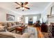 Spacious living room with hardwood floors, a ceiling fan, and comfortable furnishings at 1887 Steeplechase Dr, Rock Hill, SC 29732