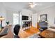 Another view of the home office with hardwood floors, dual workstations, and natural light at 1887 Steeplechase Dr, Rock Hill, SC 29732