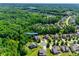 Aerial view of a home surrounded by lush trees in a peaceful neighborhood at 2205 Gallberry Ln at 2205 Gallberry Ln, Waxhaw, NC 28173