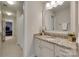 Bathroom featuring a granite vanity, neutral walls, and a tile floor at 2205 Gallberry Ln, Waxhaw, NC 28173