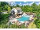 Community pool and recreational area with waterslide, playground, and water features at 2205 Gallberry Ln, Waxhaw, NC 28173