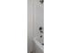 Close-up of shower and bathtub with bronze hardware and white shower surround at 2207 Catawba Trace Dr, Catawba, NC 28609