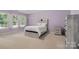 Bedroom with light purple walls and wooden furniture set at 2308 Blair House Ct, Charlotte, NC 28270