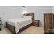 Bedroom with wooden furniture set at 2308 Blair House Ct, Charlotte, NC 28270