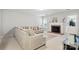 Cozy living room with a large sofa and a brick fireplace, creating a warm and inviting atmosphere at 2308 Blair House Ct, Charlotte, NC 28270